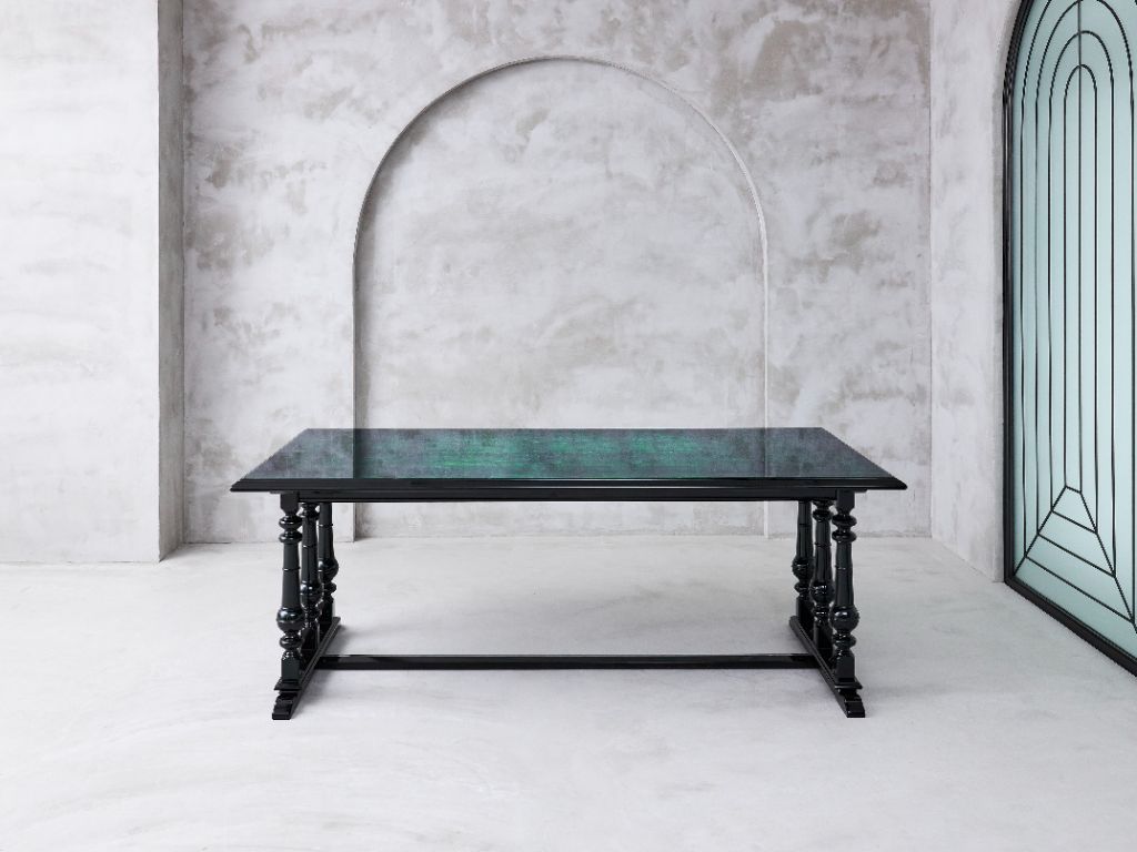 Urushi table shown in full against a pale stone wall